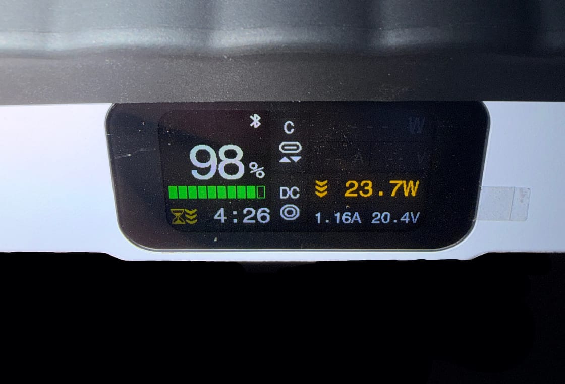 Battery pack display showing 98% charge and 4 hours 26 minutes of runtime while powering the dish